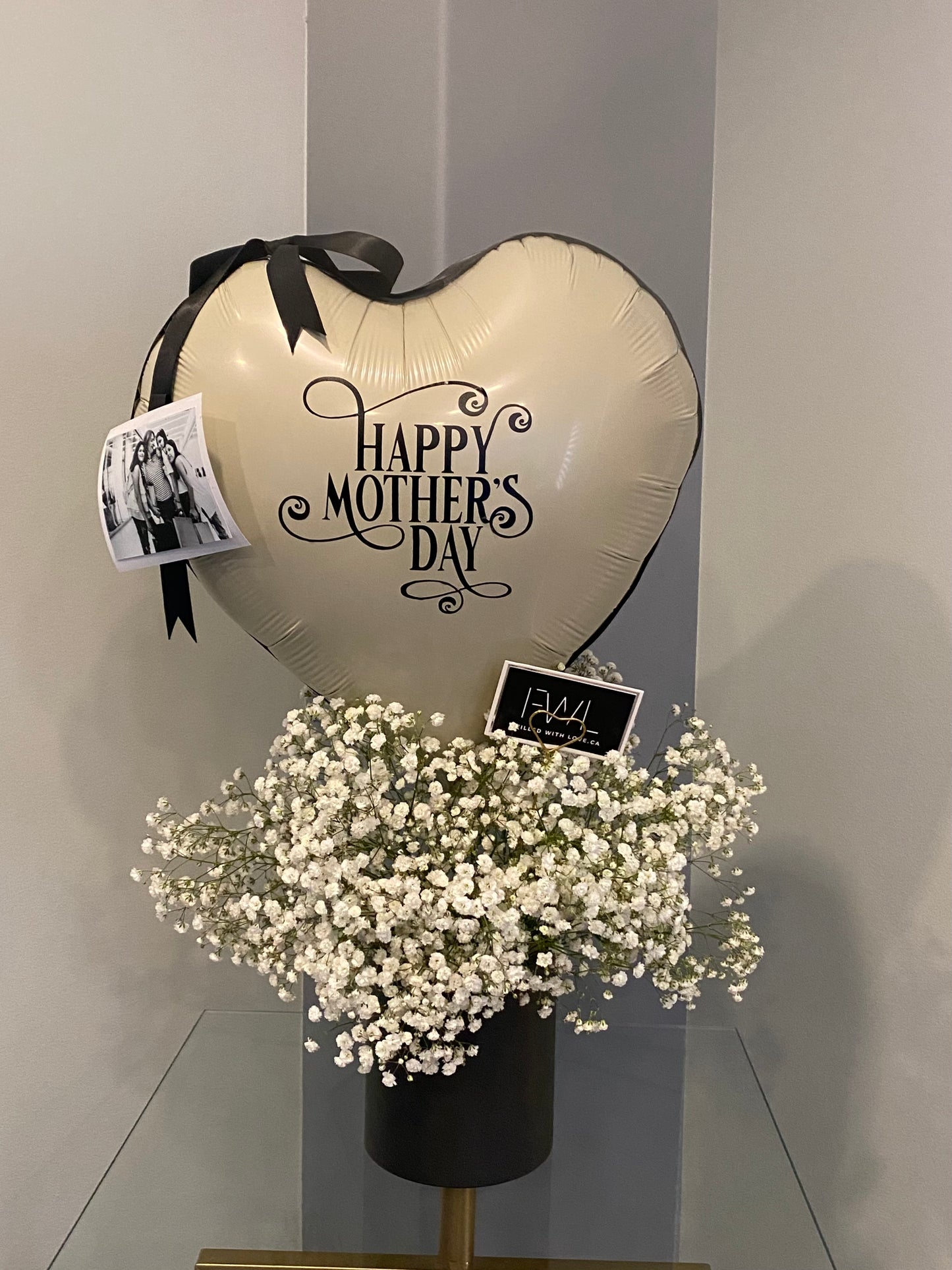 Heart and fresh baby breath arrangement