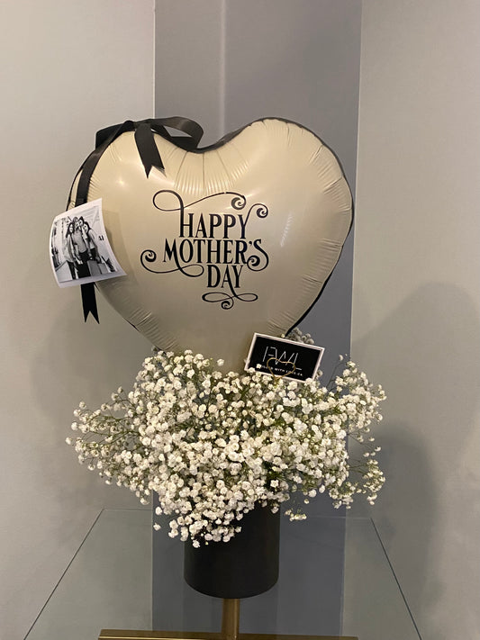 Heart and fresh baby breath arrangement