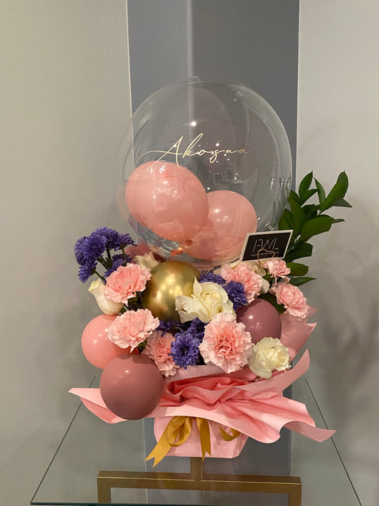 Large mixed bouquet and balloon arrangement